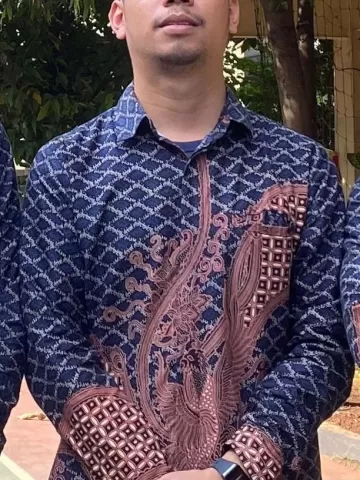 Risky Yusuf Halomoan, S.Pd