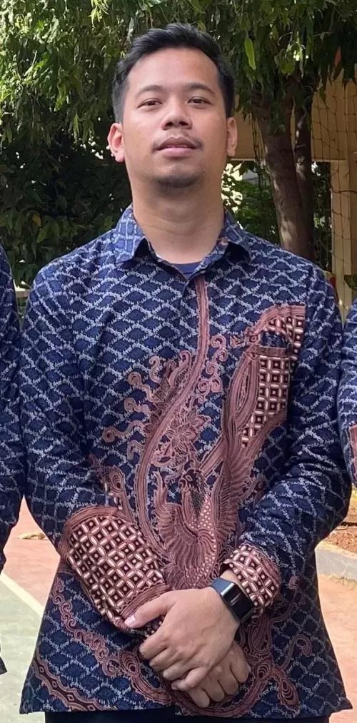 Risky Yusuf Halomoan, S.Pd